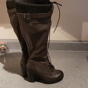 Knee high lace up heeled boots